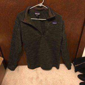 A dark brown Patagonia pullover